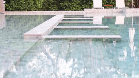 calm water flowing over stepped fountain structure