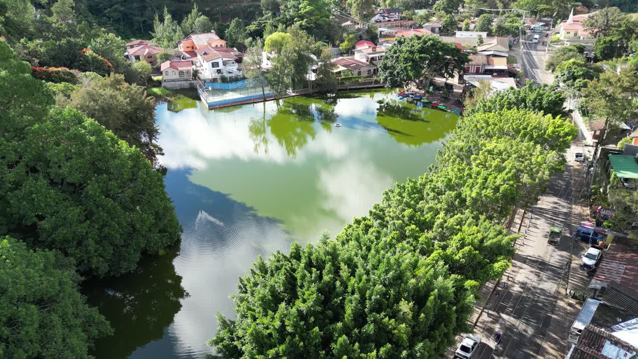 Aerial View of Santa Lucía, Honduras. Picturesque Tourist Village. Serene Lake and Vibrant Greenery