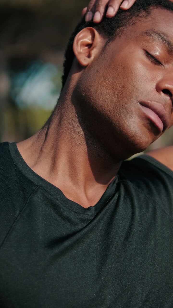 Fit Black Man Stretching in the Park