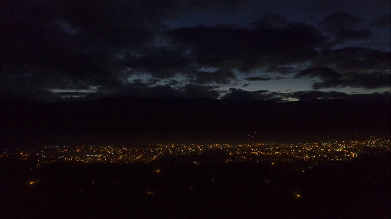 Time-lapse of sunset over El Bolson, Argentina, wide shot