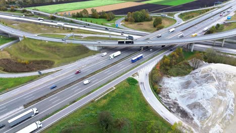 aerial drone footage 4k of highway with traffic and interchange