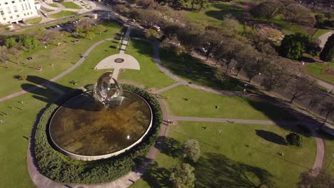 floralis generica steel sculpture in buenos aires park on sunny day, argentina