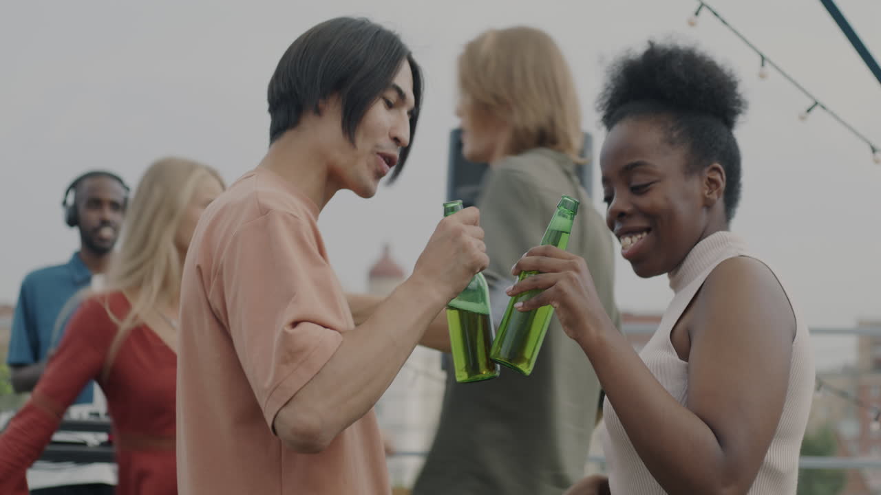 Friends Having Fun at a Rooftop Party