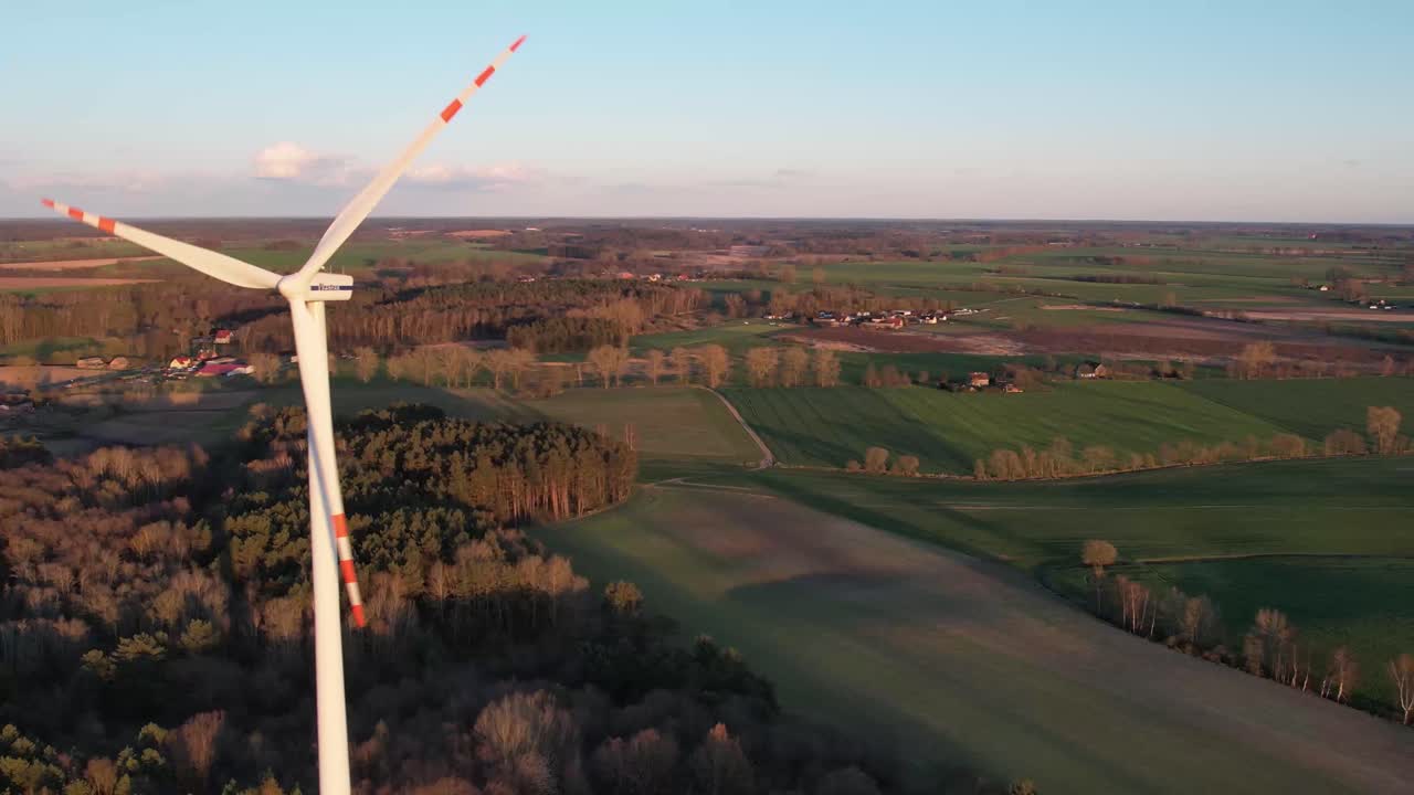 wind turbine farm at sunset, green energy, future electricity, aerial footage.