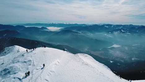 At-the-top-of-the-mountain-ridge-of-national-park-Mala-Fatra-in-Slovakia,-part-orbit-with-a-lookout,-50fps-+-100ss