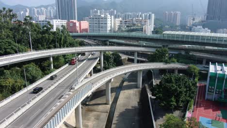 downtown hong kong city skyscrapers and urban traffic, aerial view