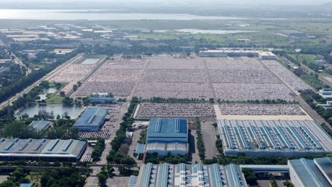 hyundai motor india limited car manufacturing plant in sipcot industrial park, large warehouse with new cars, chennai, drone shot