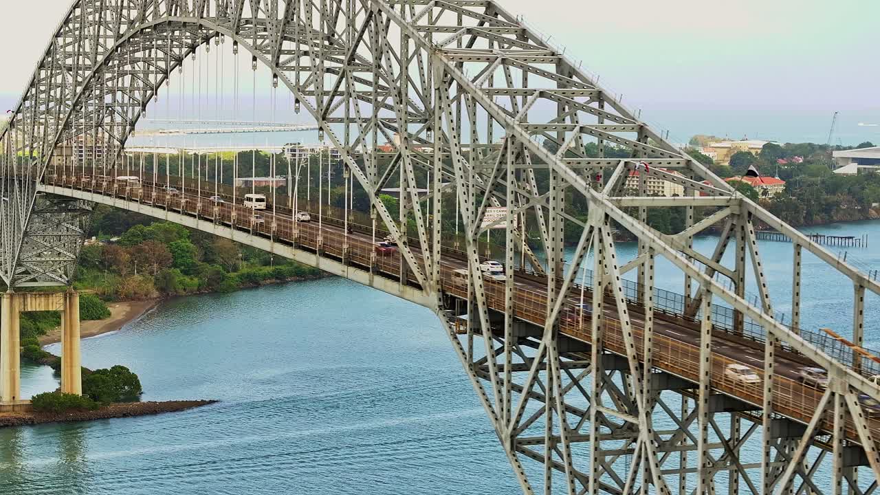 Aerial view of Panama canal first bridge with Amador causeway on the background