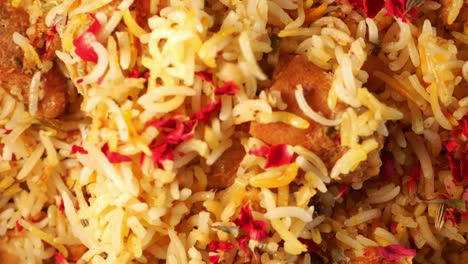 delicious chicken biryani with rose petals