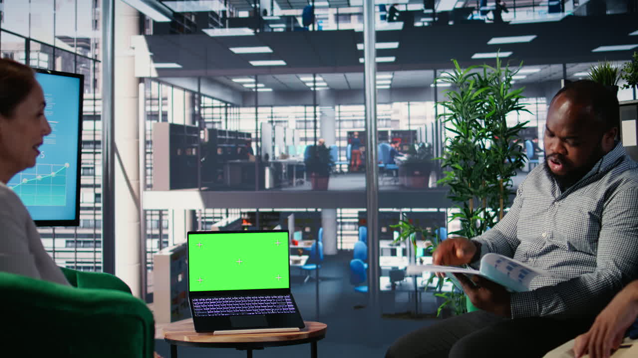 Vertical Video Empowered business CEOs discussing financial strategy with green screen