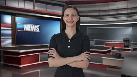 Portrait-of-Happy-Indian-female-news-journalist