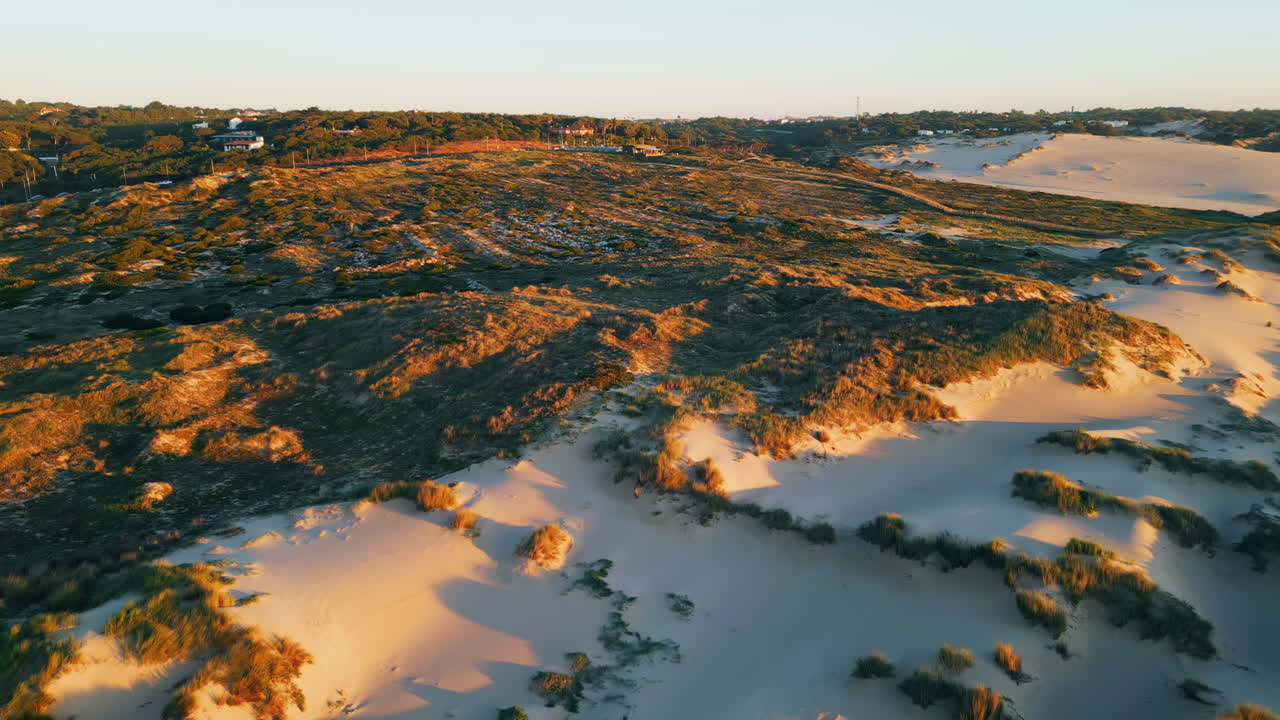 Aerial view desert landscape rough ground at sunset sunlight. Wild sandy slopes