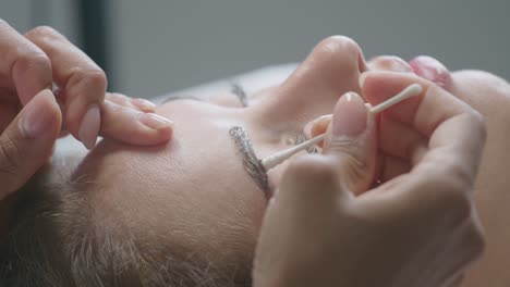 facial treatment with cotton swabs