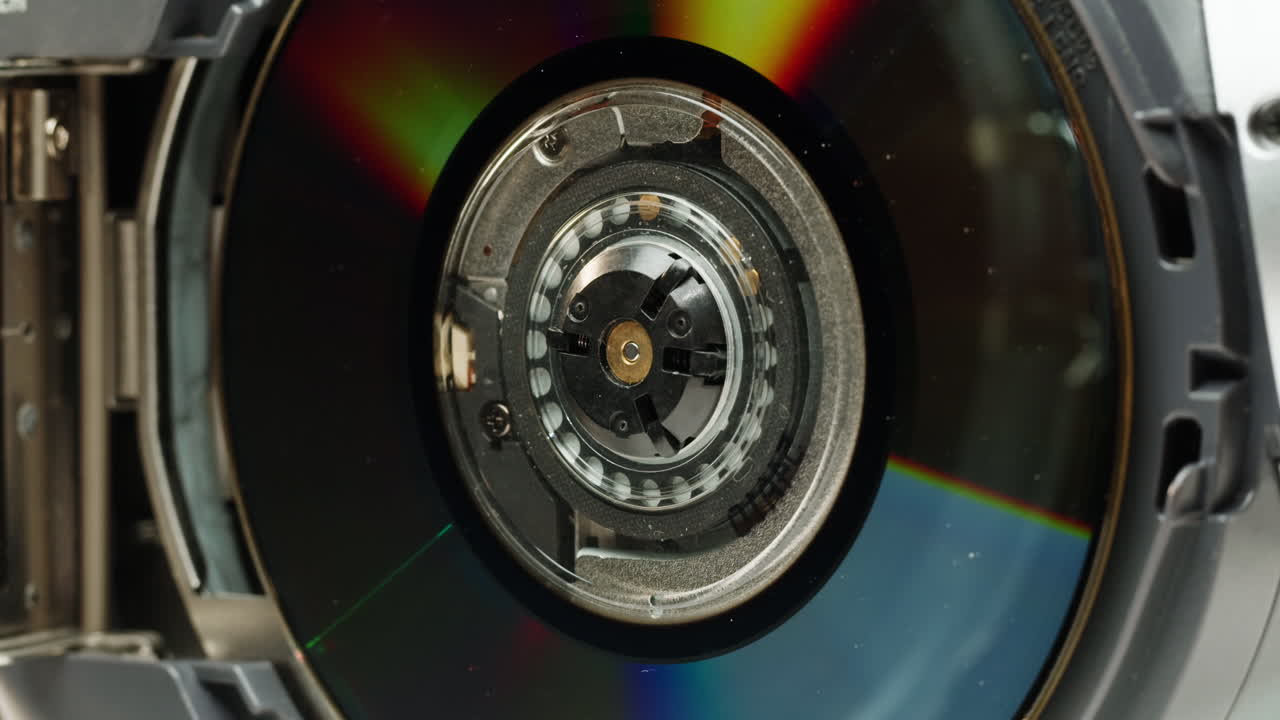 Vintage cd music player with disk inside close-up. Using portable music player for listening with compact disc