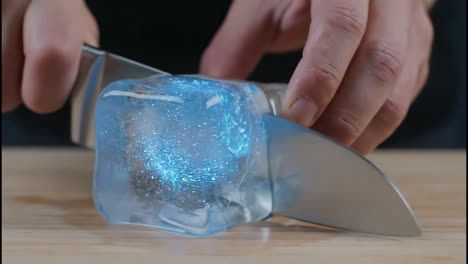 cutting a glowing and sparkling ice cube