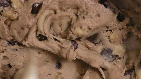 close-up on making and mixing chocolate chip cookies dough, 4k