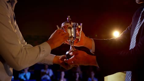 asian businessman receiving award in business seminar in auditorium 4k