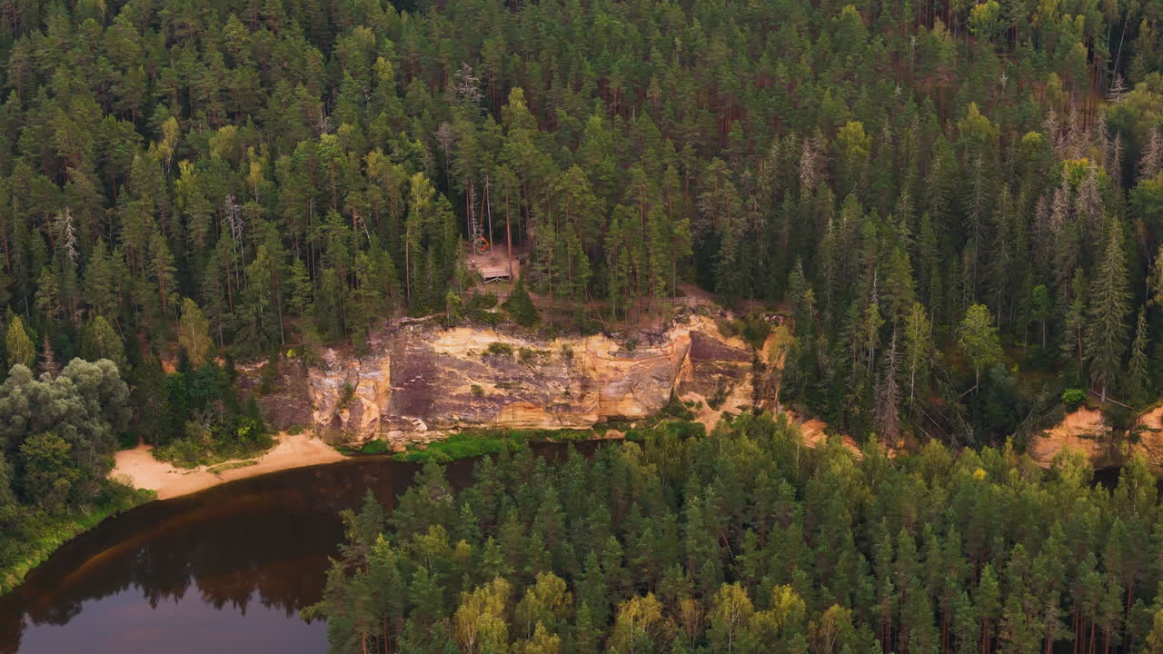 Beautiful woodland and geological cliff side in Latvia, aerial drone view