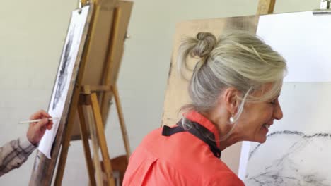 artist drawing sketch on canvas 4k