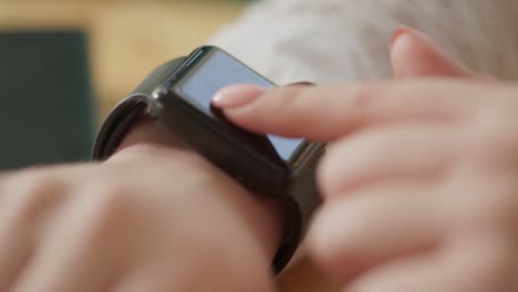 woman using a smartwatch