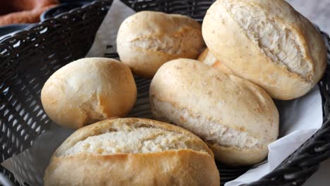 basket of freshly baked dinner rolls