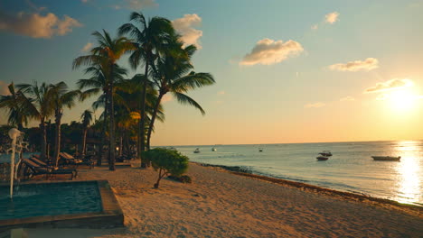 Empty-tropical-beach-resort-at-sunset