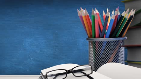 Animation-of-school-items-and-glasses-on-blue-background