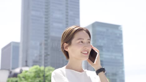 a woman talking on a smartphone