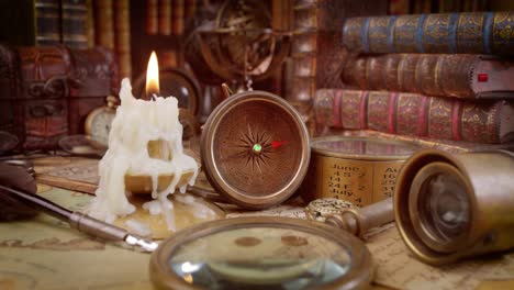 vintage style travel and adventure. vintage old compass and other vintage items on the table.