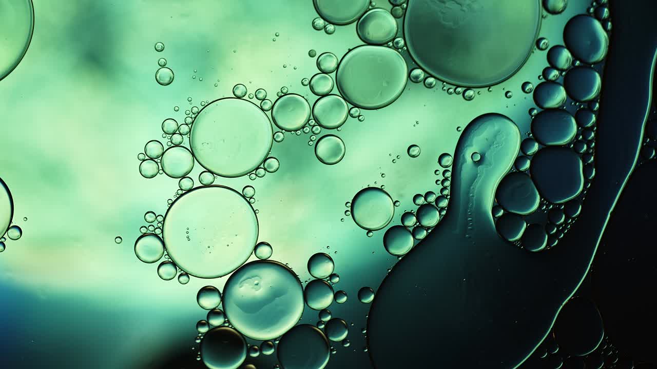 Abstract Colorful Food Oil Drops Bubbles and spheres Flowing