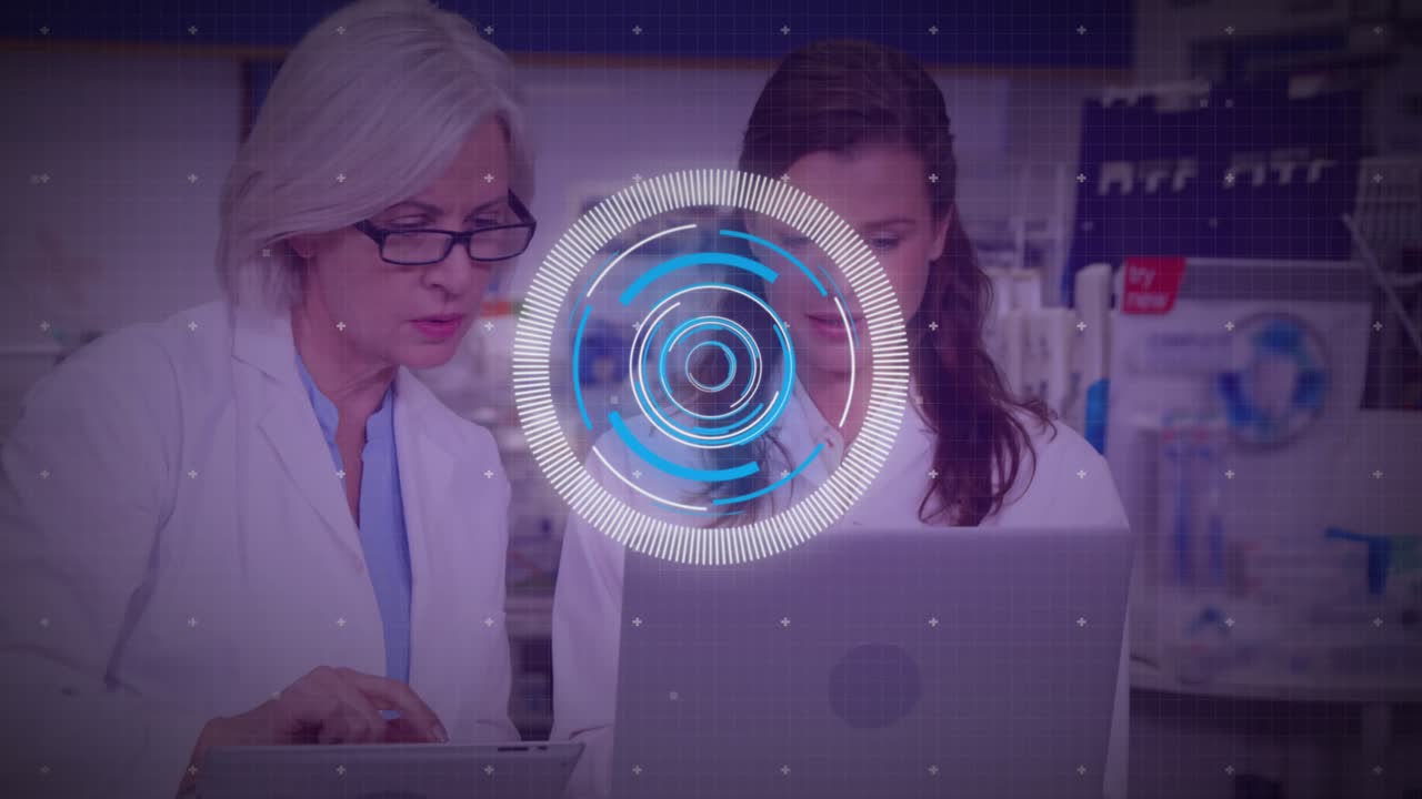 Senior scientist tapping tablet and mentoring junior tech while reviewing lab data, HUD animating