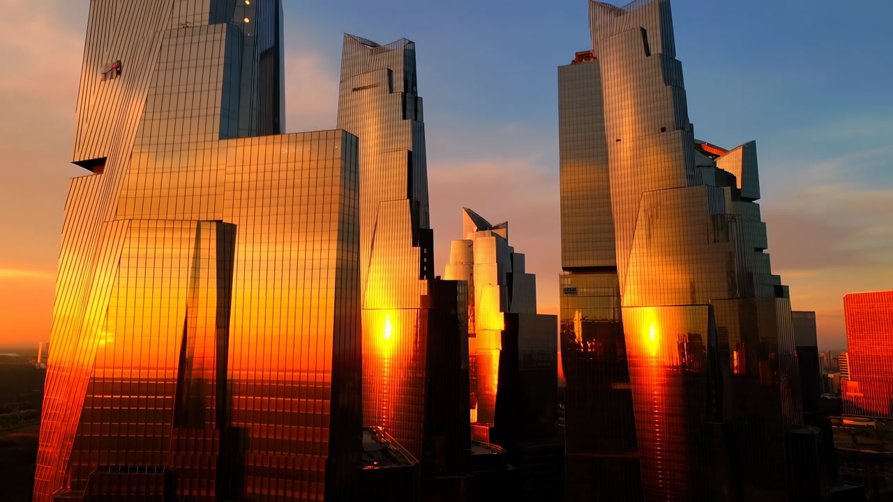 Golden Sunset Reflecting On Glass Skyscrapers, Dramatic Skyline Bathed In Warm Light, Mirrored Panels Glowing,