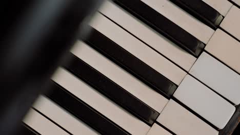 Refurbished-old-piano-keys-filmed-from-above