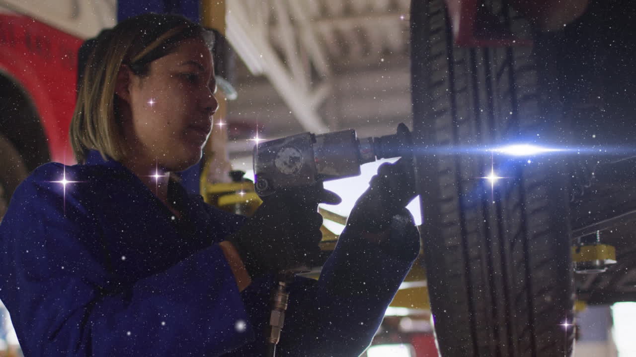 female mechanic tightening lug nuts inside repair garage, displaying animated torque gauge overlay