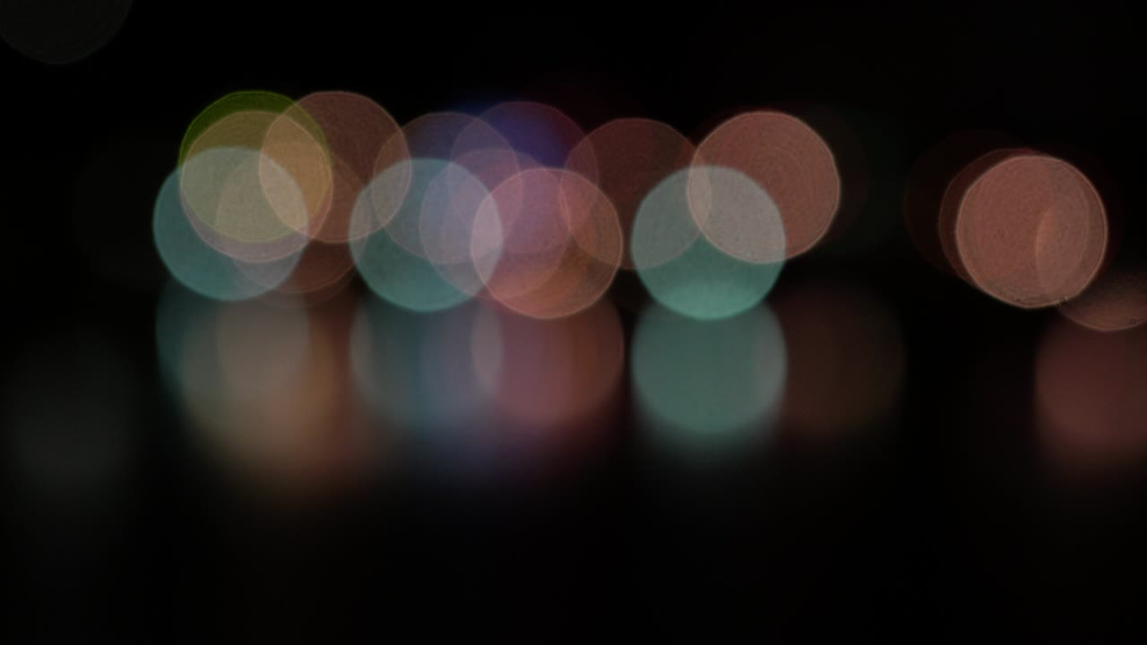 the blurred light bokeh on water abstract background, Concept for making blur light background.