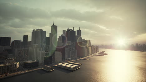 aerial view of a city skyline at sunrise/sunset