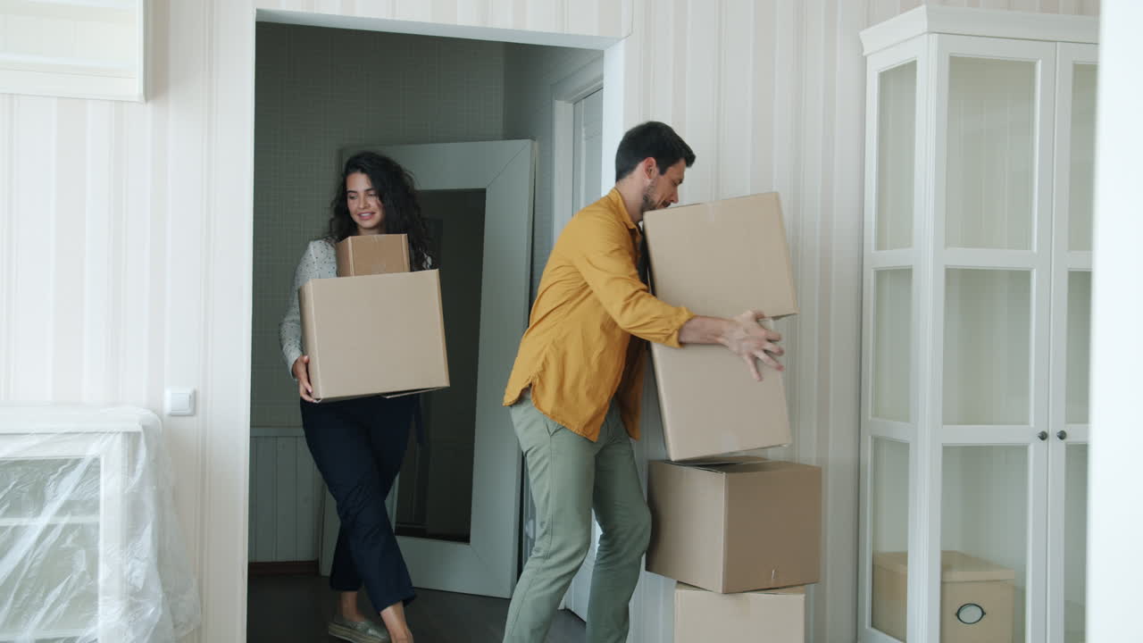Couple Moving into New Apartment