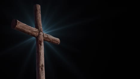 4k cross made of wood on a dark or black background