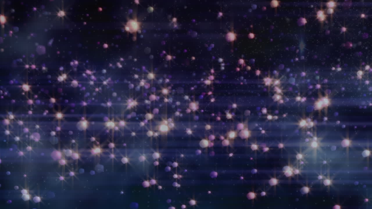 검은 바탕 위에 빛나는 다채로운 반점의 애니메이션