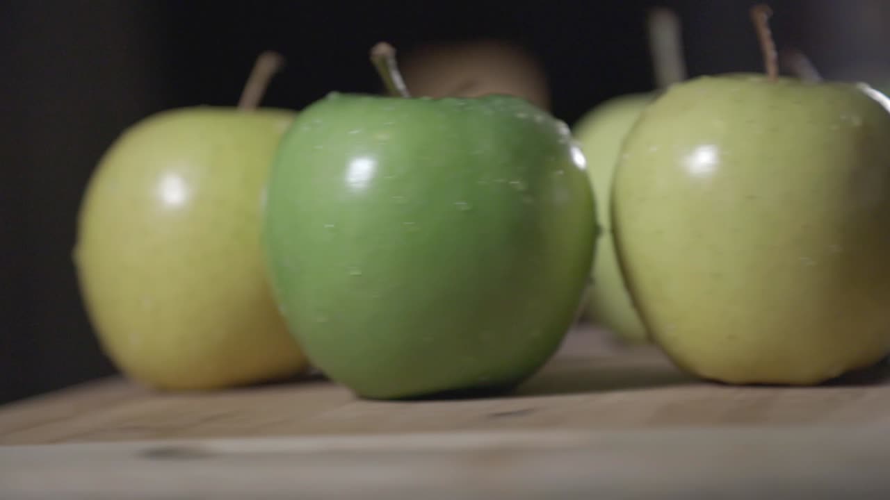 The Fresh Green Apples At The Top Of The Table - Closeup Shot