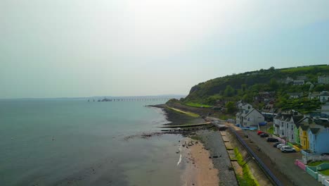 Aerial-shot-of-Whitehead,-a-seaside-village-in-Co