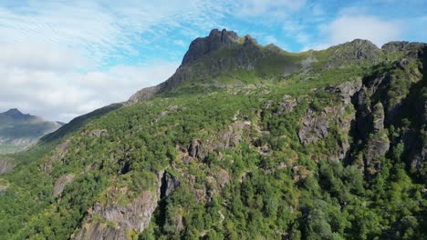 lofoten islands mountain landscape in svolvaer, norway - aerial 4k tilting up