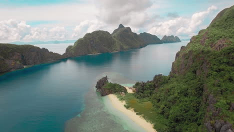 dolly in establishing shot of a beautiful island while sunny day in palawan, philippines