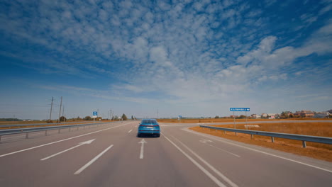 luxury comfortable ecology electric vehicle on the road. modern electric car on the road with blue sky.