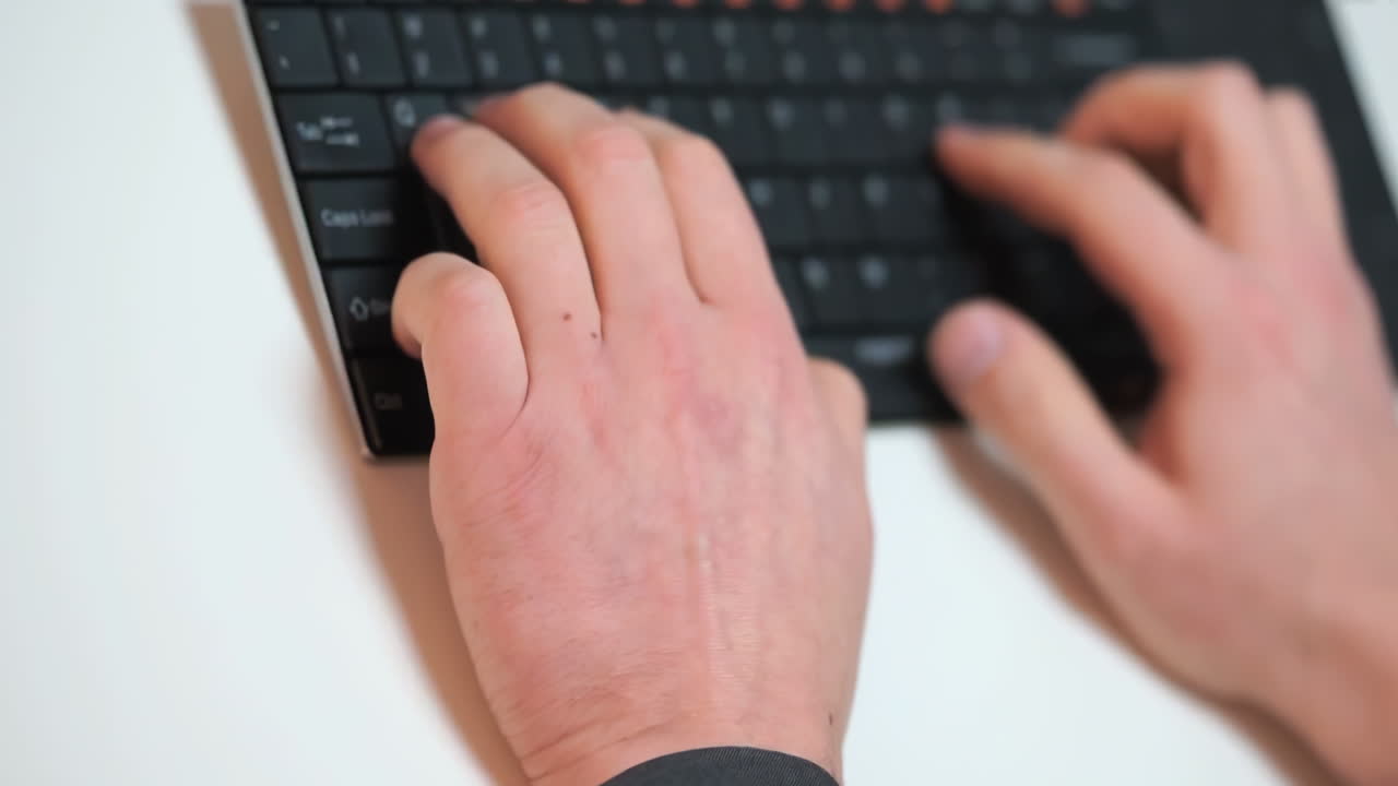 Businessman sitting in restaurant or cafe bar and typing on a laptop businessman working on computer keyboard and smart phone for work