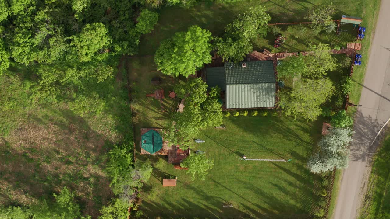 Aerial top down shot of countryside house and garden layout
