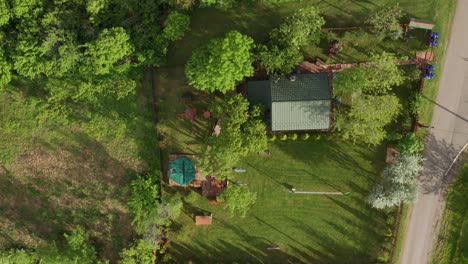 Aerial-top-down-shot-of-countryside-house-and-garden-layout