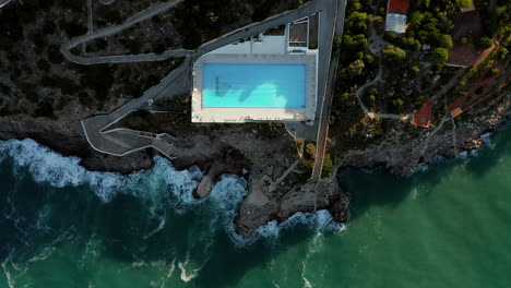 top view of seafront pool at the luxury hotel resort of perla del golfo in terrasini, palermo, sicilia, italy
