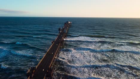 oceanside muelle ventoso tarde puesta de sol