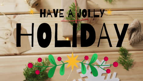 animation of have a jolly holiday text over christmas decorations on wooden background